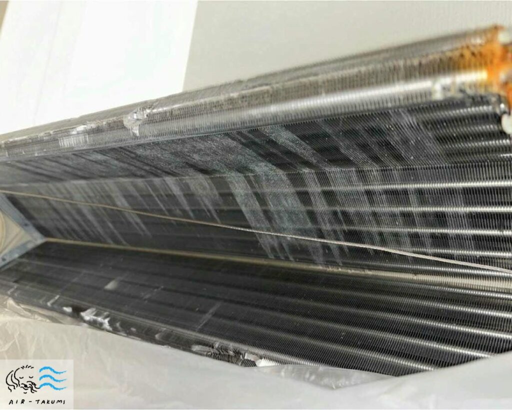 洗剤が原因で白くなっている熱交換器